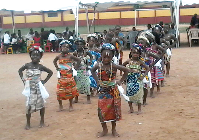 Some of the graduates in a cultural display. Some of the graduates in a cultural display.